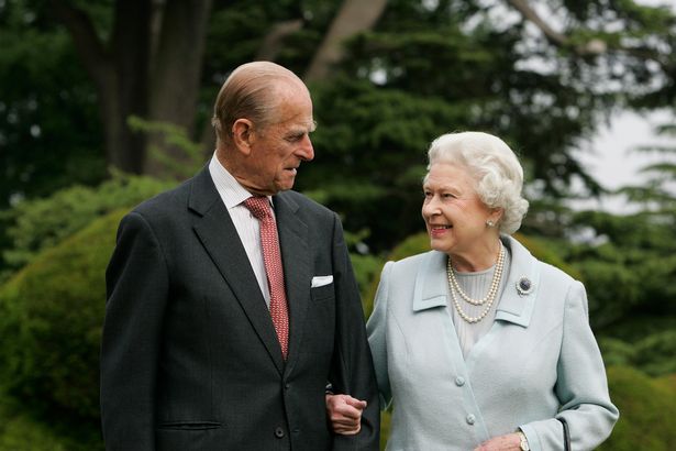 Queen and prince philip in garden