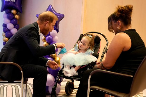 Harry chats to six-year-old Esmee Mcglinchey at the WellChild Awards