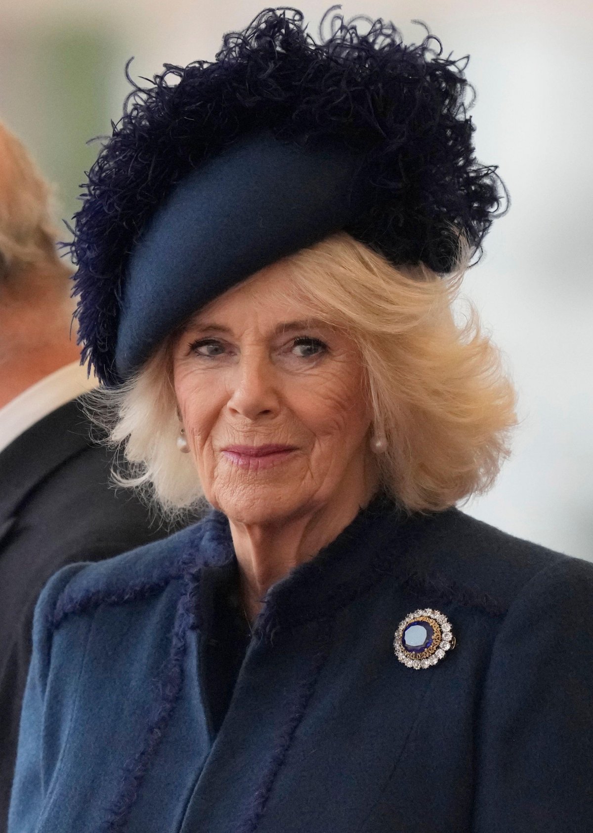 Queen Camilla attends a welcome ceremony for the President of South Korea at the start of his state visit to Britain on November 21, 2023 (Frank Augstein/PA Images/Alamy)