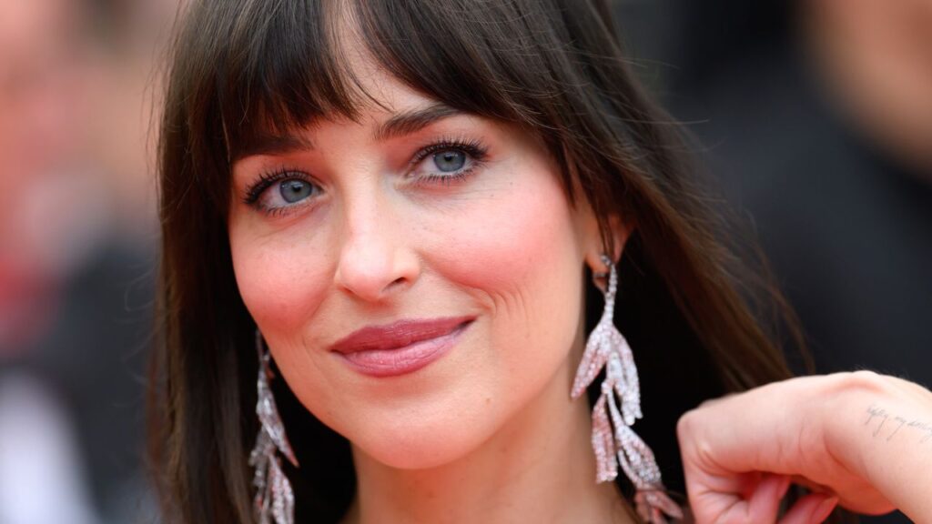 Dakota Johnson Just Channeled Pamela Anderson With a Bombshell Updo Dakota Johnson Just Channeled Pamela Anderson With a Bombshell Updo