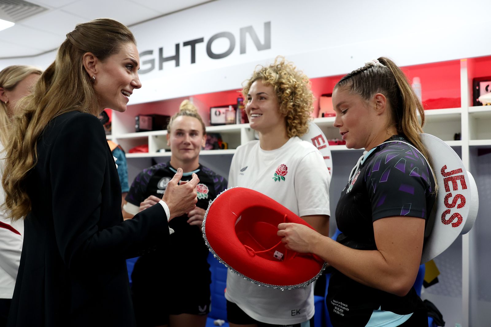 Catherine Princess of Wales speaks with Megan Jones Ellie Kildunne and Jessica Breach of England in the dressing room as...