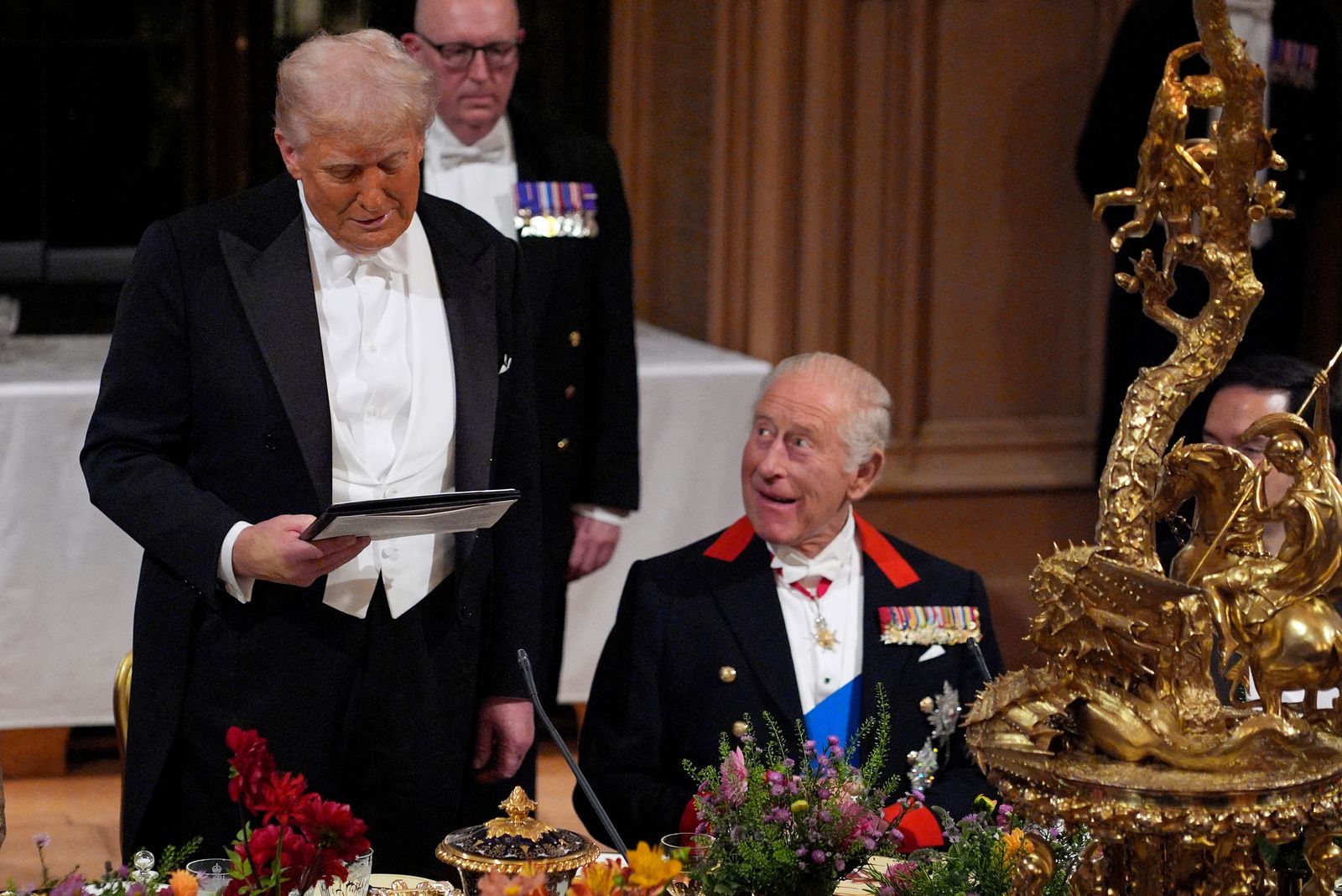 President Donald Trump delivers a speech as Britain's King Charles III watches on during a State Banquet at Windsor...