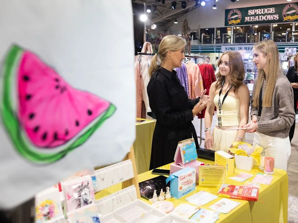  Sophie, Duchess of Edinburgh, visits with teenage entrepreneurs Anastasia and Mercedes Korngut at the market stall for their business Small Bits of Happiness at Spruce Meadows during the Masters tournament Friday.