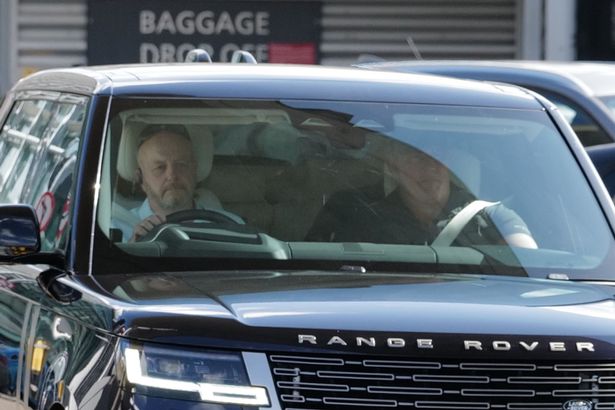 Prince Harry with his Security at Heathrow airport