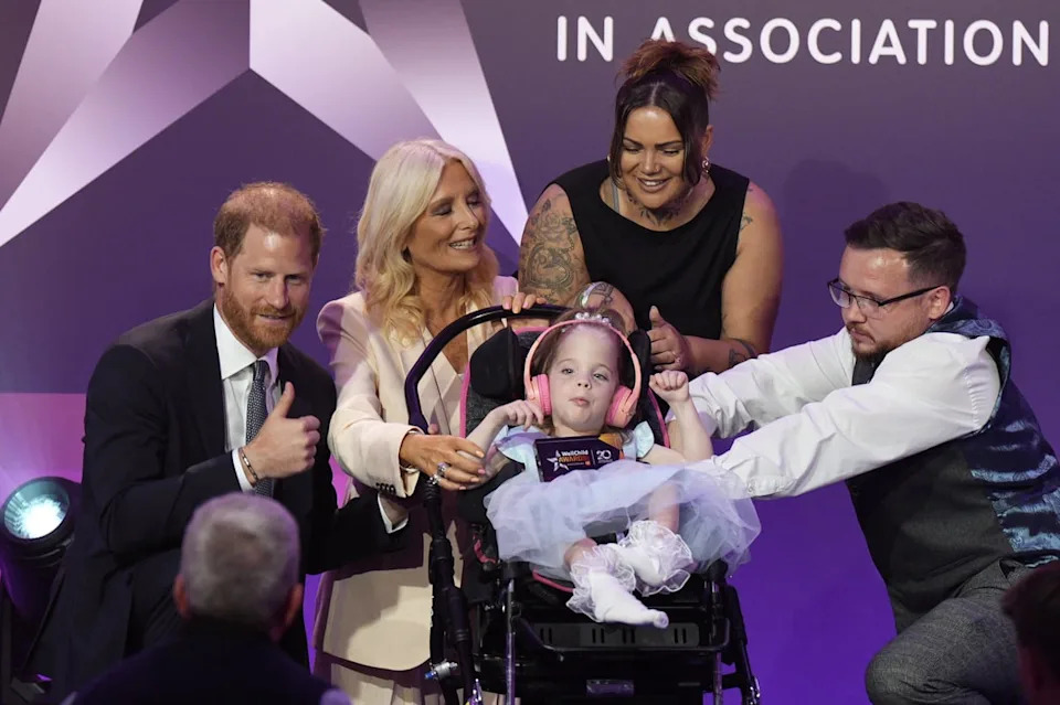 Prince Harry, Duke of Sussex, and Gaby Roslin present the Inspirational Child 4-6 award to six-year-old Esmee Mcglinchey, at the annual WellChild Awards 2025 (via REUTERS)