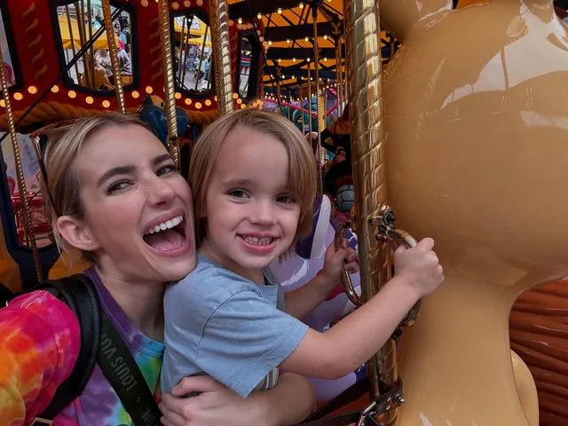 Emma Roberts/Instagram Emma Roberts and son Rhodes smile for a carousel selfie at Disneyland in Anaheim, Calif., in 2024.