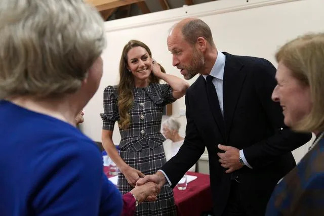 Alastair Grant - WPA Pool/Getty Kate Middleton and Prince William meet with members of the National Federation of Women's Institute (WI)