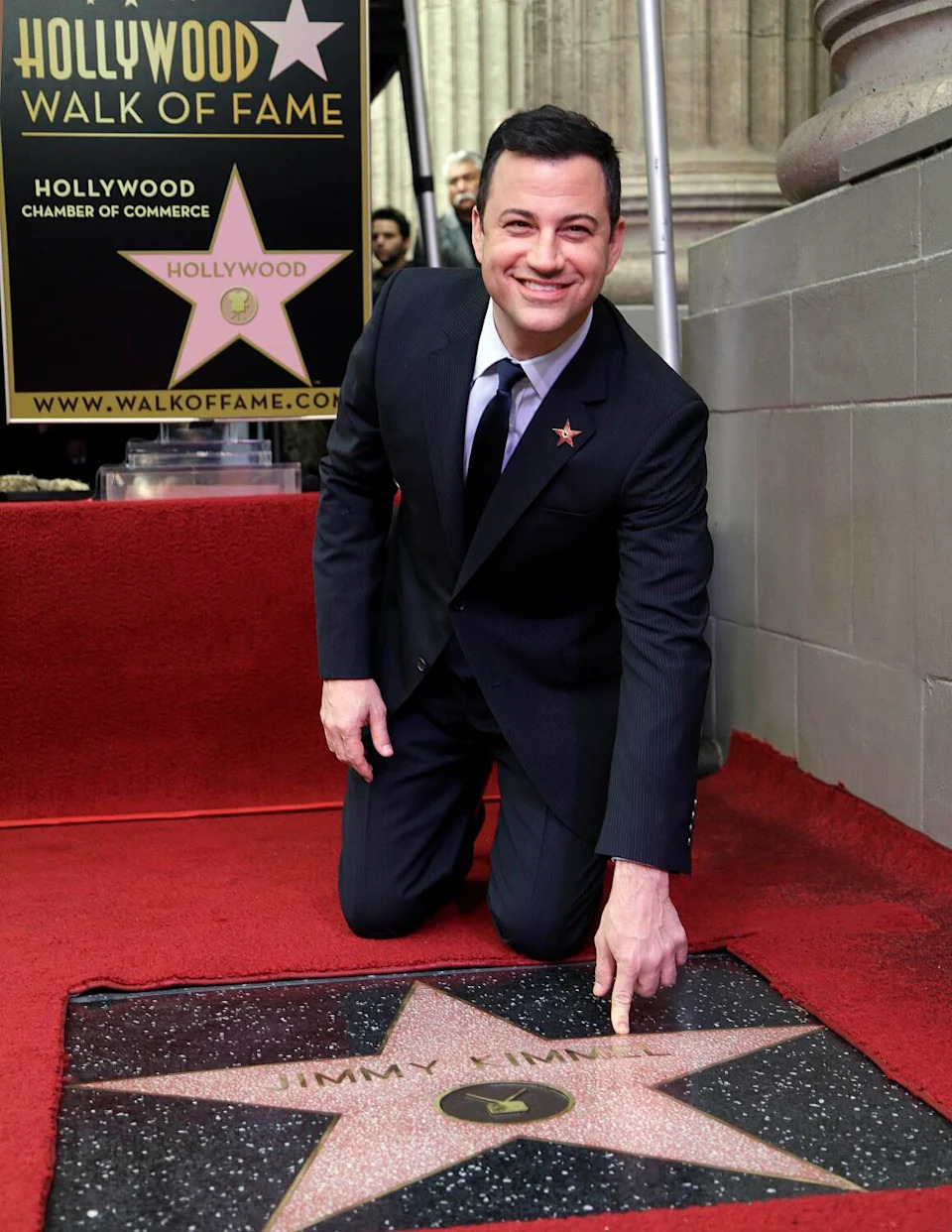 Jimmy Kimmel celebrates as he receives his star on the Hollywood Walk of Fame.