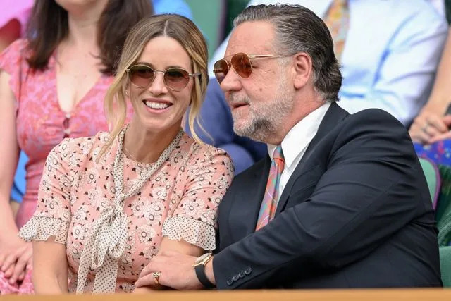 Karwai Tang/WireImage Britney Theriot and Russell Crowe at Wimbledon on July 1, 2025