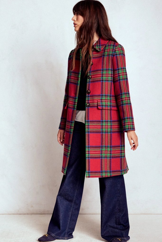 model in long tartan coat