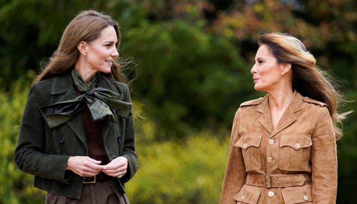 Britains Catherine, Princess of Wales and U.S. first lady Melania Trump walk as they tour Frogmore Cottage in Windsor, Britain, September 18, 2025. REUTERS/Nathan Howard/Pool