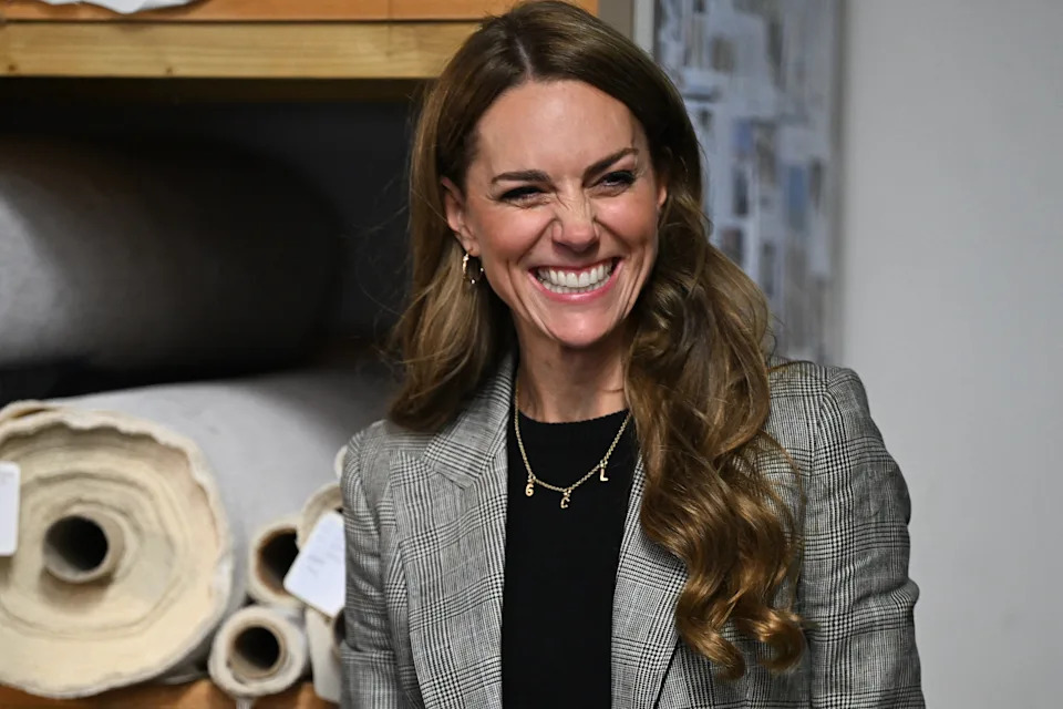 Kate Middleton attends engagement in in Sudbury wearing a plaid suit