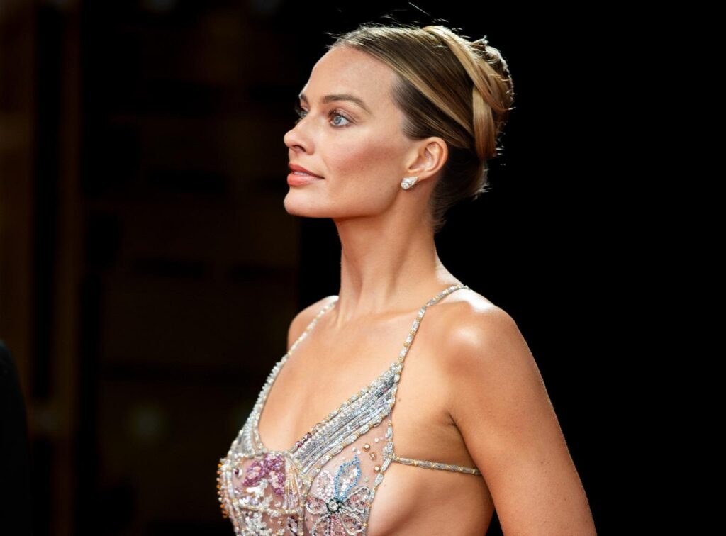 Margot Robbie Turns Heads In Bold ‘Naked Dress’ Ten Months After Giving Birth - M10News
