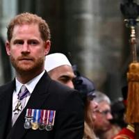 Britain's Prince Harry, the Duke of Sussex, looks on as his father leaves Westminster Abbey after being crowned King Charles III in 2023 | News