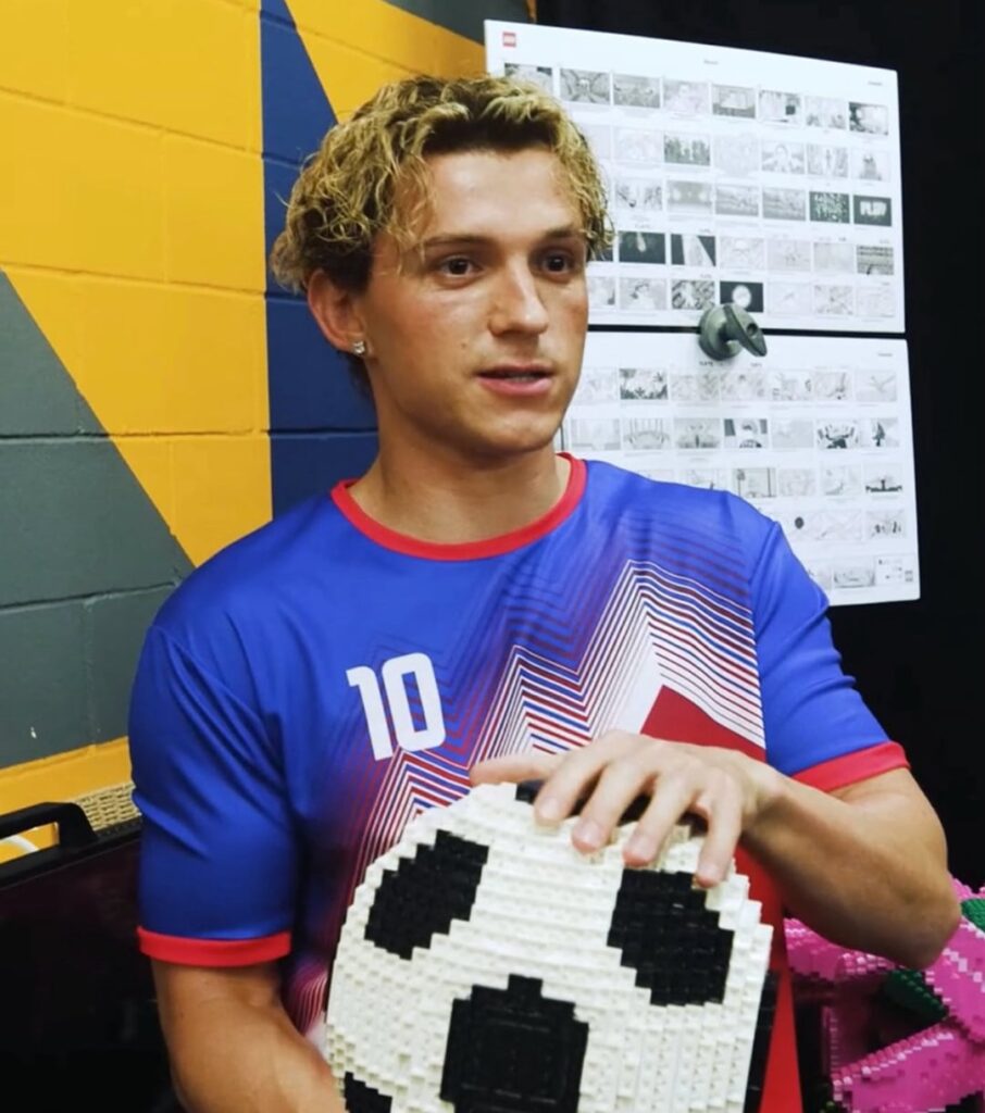Tom Holland debuts blonde hair for LEGO commercial