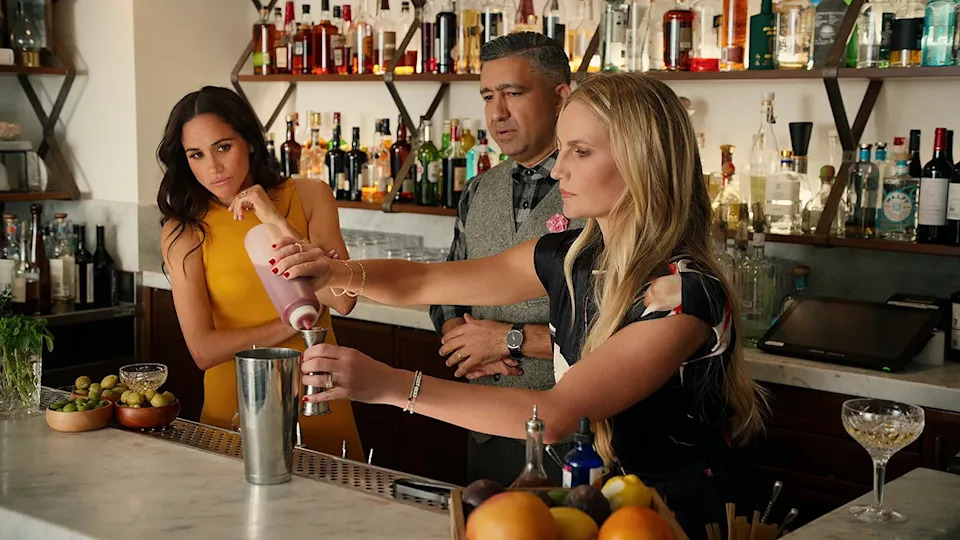 Meghan Markle looking as a woman makes a cocktail from a bar during season 2 of "With Love, Meghan."