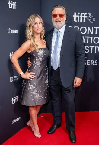 George Pimentel/Shutterstock Russell Crowe and Britney Theriot at the 'Nuremberg' world premiere at TIFF on Sept. 7, 2025
