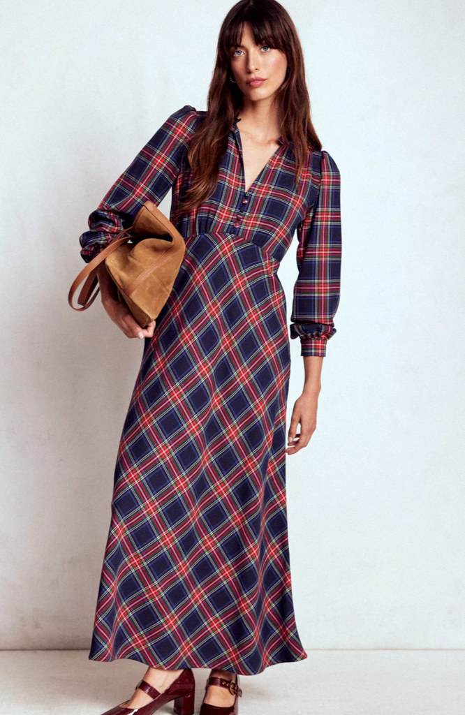 model in maxi tartan dress