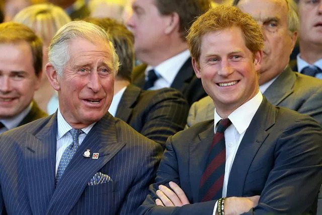Chris Jackson/Getty King Charles and Prince Harry in 2014.