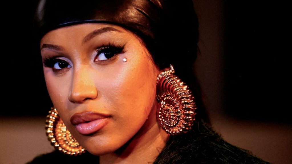 Cardi B throws a pen after a pregnancy question about Stefon Diggs