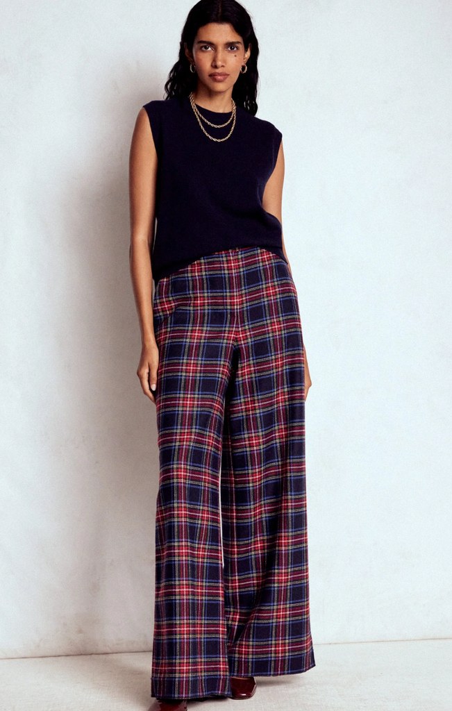 model in tartan trousers