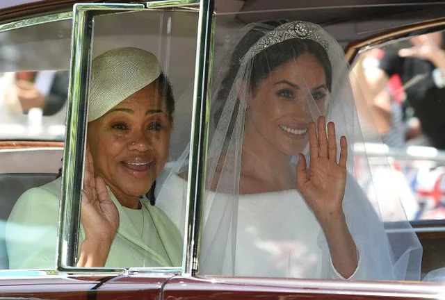 OLI SCARFF/Getty Images Meghan Markle and her mother, Doria Ragland, arrive at her wedding ceremony on May 19, 2018