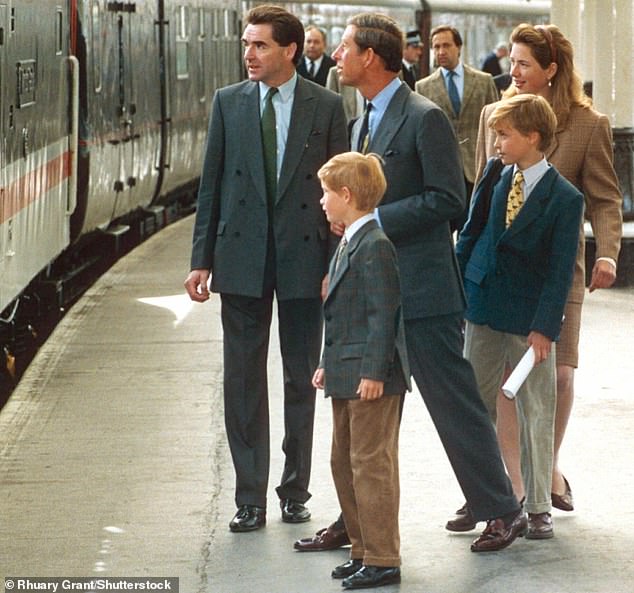 Legge-Bourke is pictured with Charles, Harry, William and bodyguard Tony Parker at Aberdeen Station in August 1993
