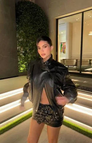 Instagram/Kylie Jenner Kylie Jenner with a skirt made out of belts