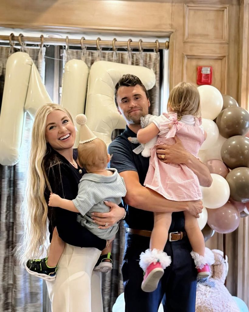 Erika Frantzve Charlie Kirk holding kids