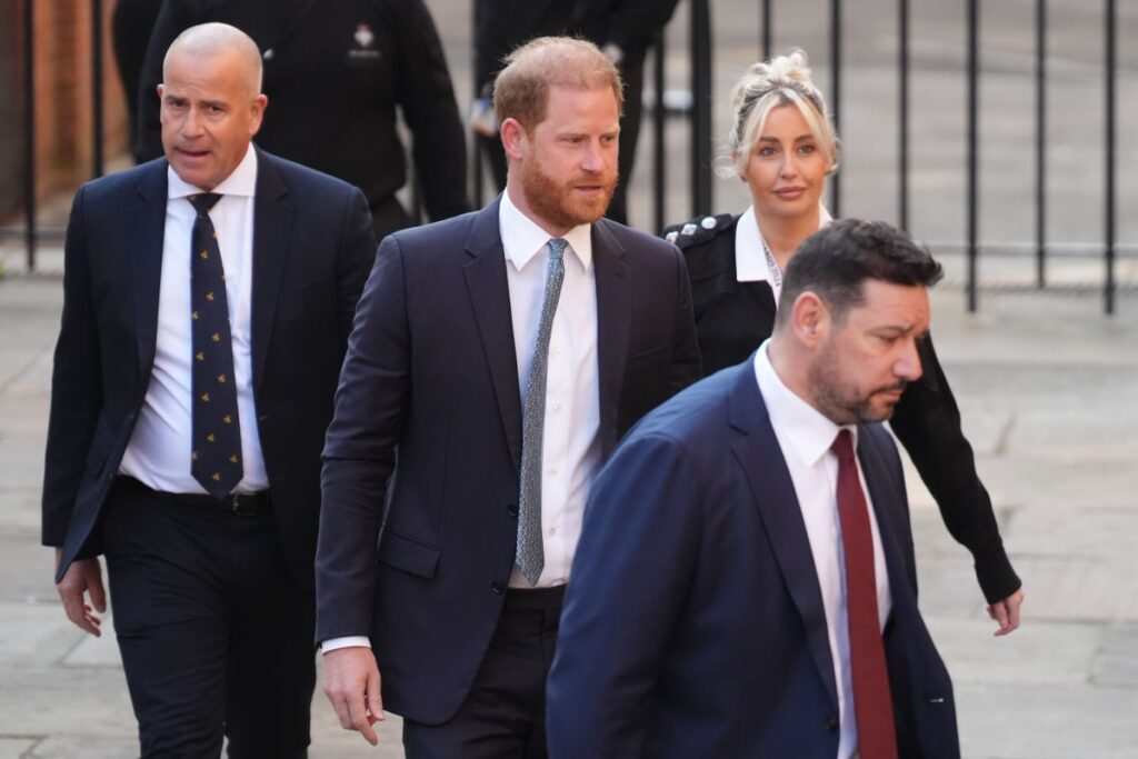 Harry and Meghan ‘felt forced to step back’ from royal family, court told