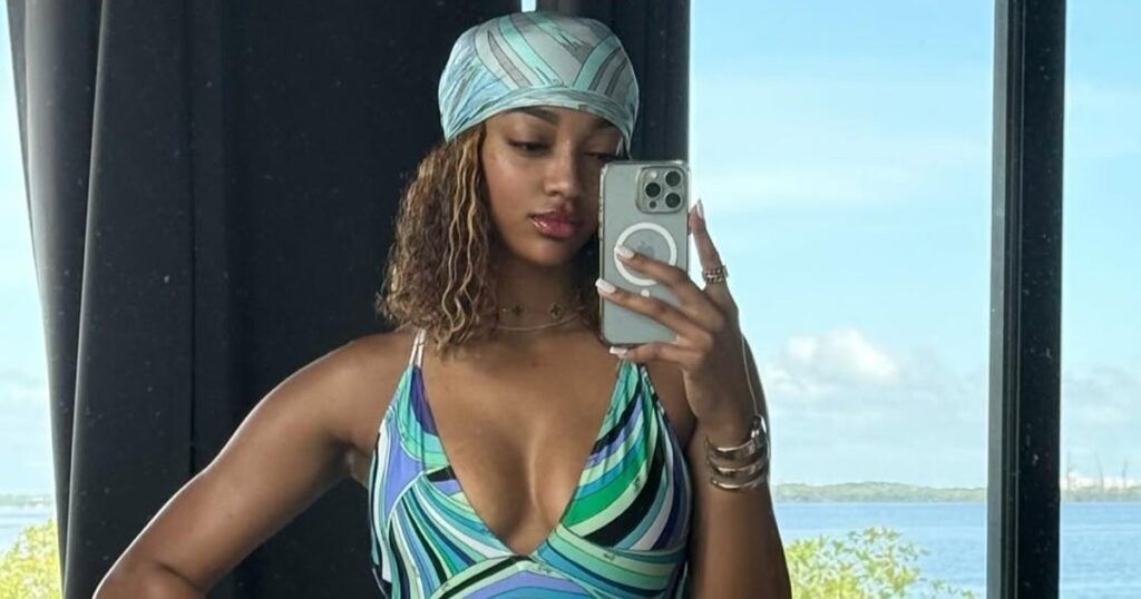 Angel Reese Shows Off Her Toned Body in Swimsuit Look 