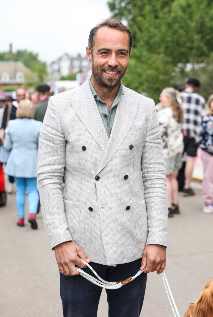 James Middleton outside in white jacket