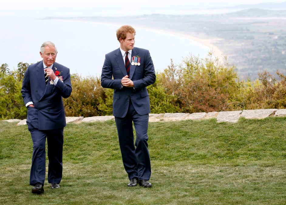 Prince Harry chats with Prince Charles, Prince of Wales