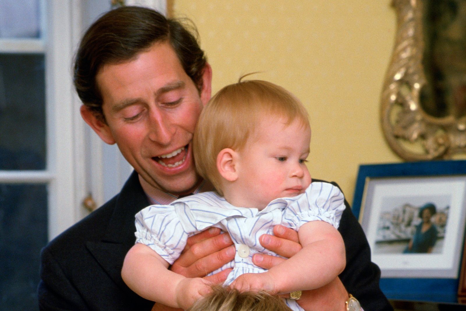 Image may contain: Charles, Prince of Wales, Face, Head, Person, Photography, Portrait, Wristwatch, Art, Painting, and Baby