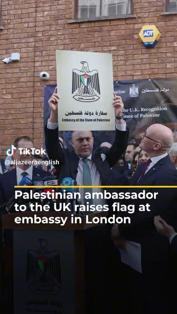 The Palestinian Ambassador to the UK, Husam Zomlot, has raised the Palestinian flag outside the Palestine Mission in central London to mark its transition to Palestine's embassy.