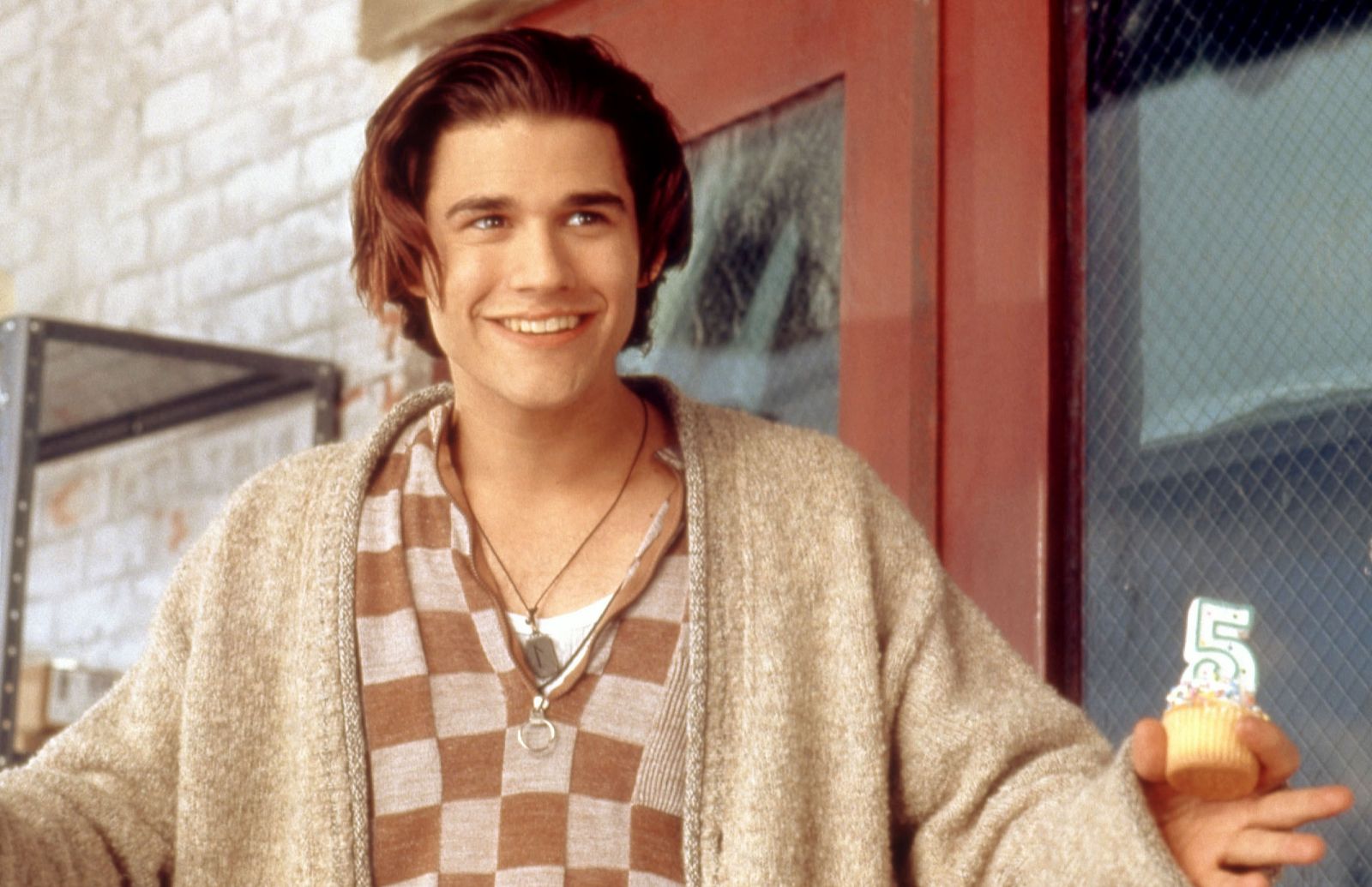 Image may contain Johnny Whitworth Clothing Sleeve Apparel Human Person Long Sleeve Pendant and Sweater