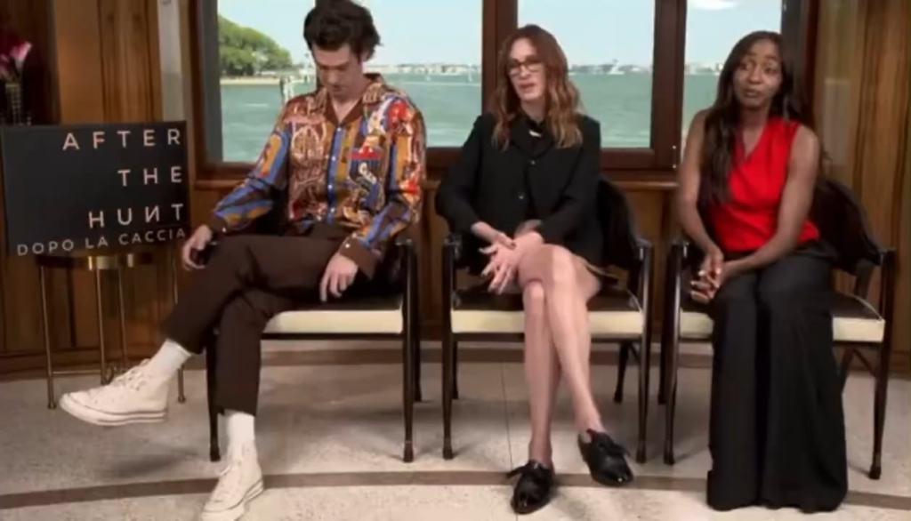 after being deliberately excluded, ayo edebiri answering a question about the political state of the hashtag “metoo” and  “black lives matter” movement with poise and grace for ‘after the hunt’ press in venice
