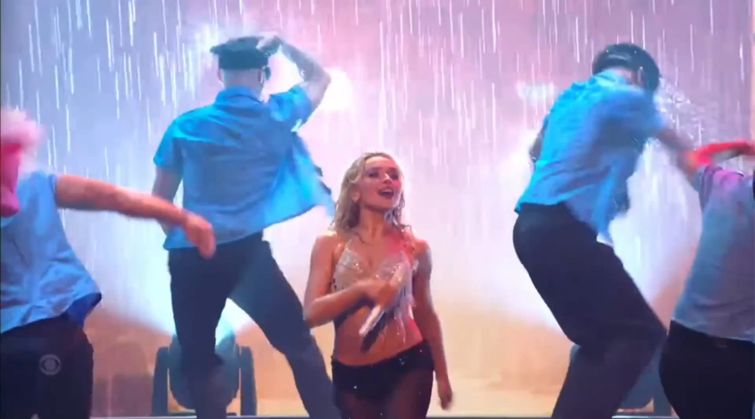 Performers held up signs reading "Protect Trans Rights", "Dolls Dolls Dolls", and "Love Each Other", among others, during Sabrina Carpenter's performance of "Tears" at the VMAs