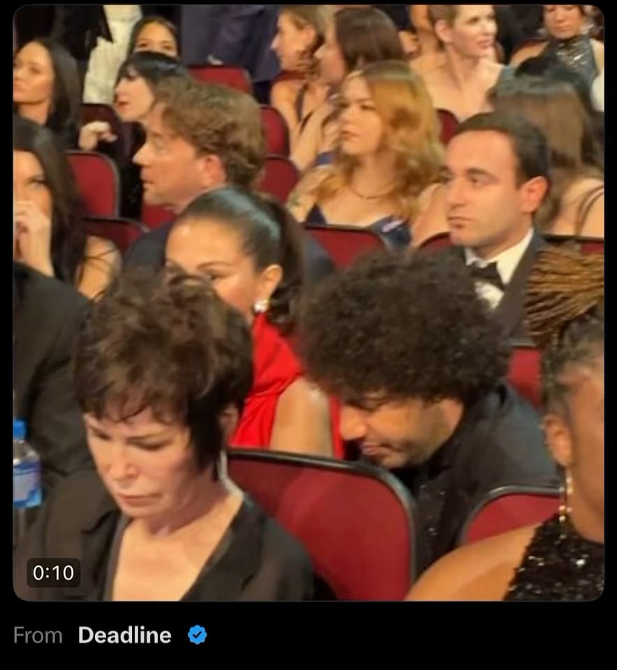 Selena Gomez caught mouthing “Marty’s texting Meryl” to Benny Blanco during an Emmy’s commercial break