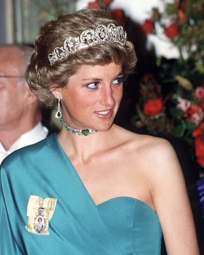 Princess Diana wearing The Spencer Diamond Tiara, Queen Mary's Cabochon Emerald And Diamond Choker Necklace (a Gift From The Monarch) and The Royal Family Orders. (Getty Images)