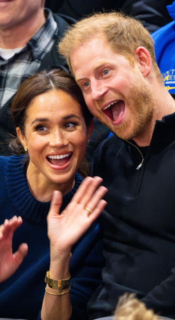 Prince Harry posing with Meghan Markle