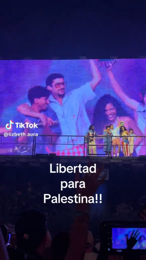 A member of Bad Bunny's crew holds a tambourine with the Palestinian flag during the last concert in Puerto Rico.
