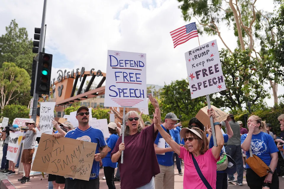 Demonstrators picket in response to the suspension of Jimmy Kimmel's late-night show outside of Walt Disney Studios in Burbank, Calif., on Thursday, Sept. 18, 2025. (AP Photo/Jae C. Hong)