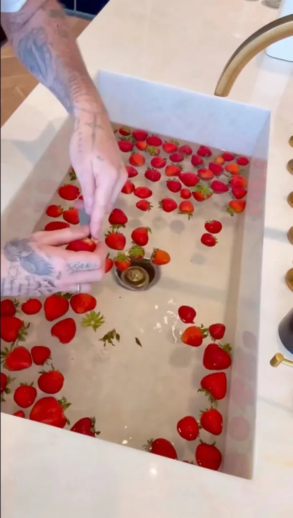 On Friday, the former model shared a step-by-step video of himself preparing the strawberries. Brooklyn Peltz Beckham/Instagram