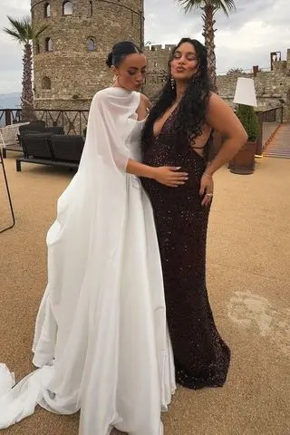 Vanessa Hudgens/Instagram Vanessa Hudgens showing her baby bump while at a friend's wedding.