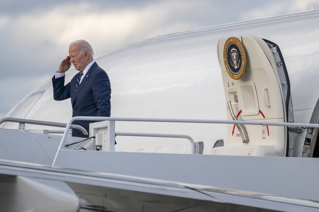Joe Biden saluting outside Air Force One