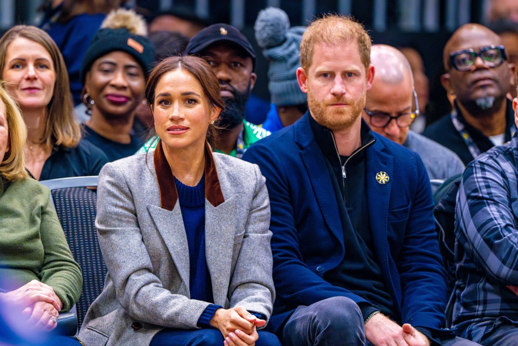 Meghan and Harry looking serious