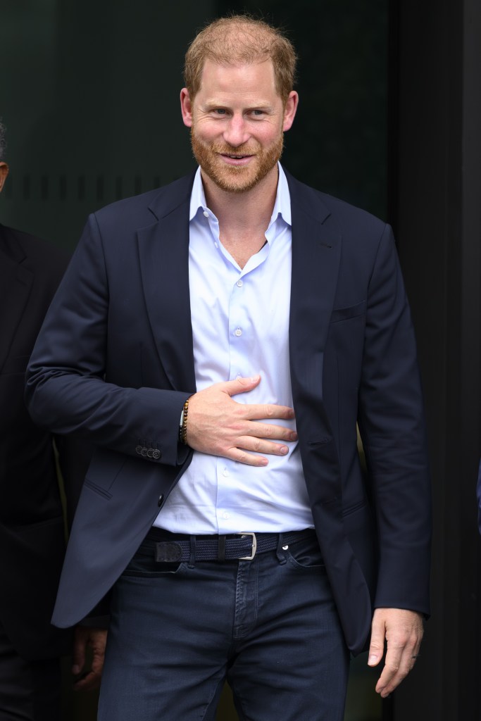 Prince Harry walking in suit