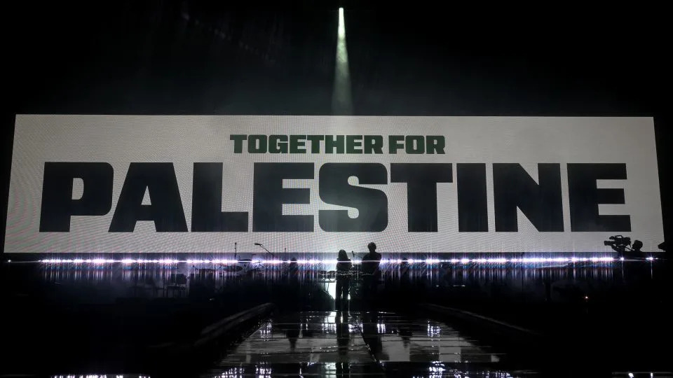 Sama’ Abdulhadi and Jamie XX perform during the Together for Palestine concert. - Samir Hussein/WireImage for ABA/Getty Images