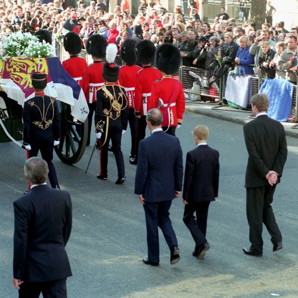  Prince William, Prince Philip, Prince Charles, Prince Harry and Earl Spencer walking behind Princess Diana's coffin. 